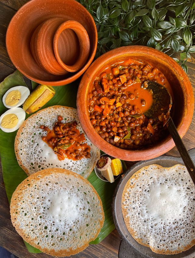 A colourful spread of traditional Sri Lankan dishes representing different regional cuisines