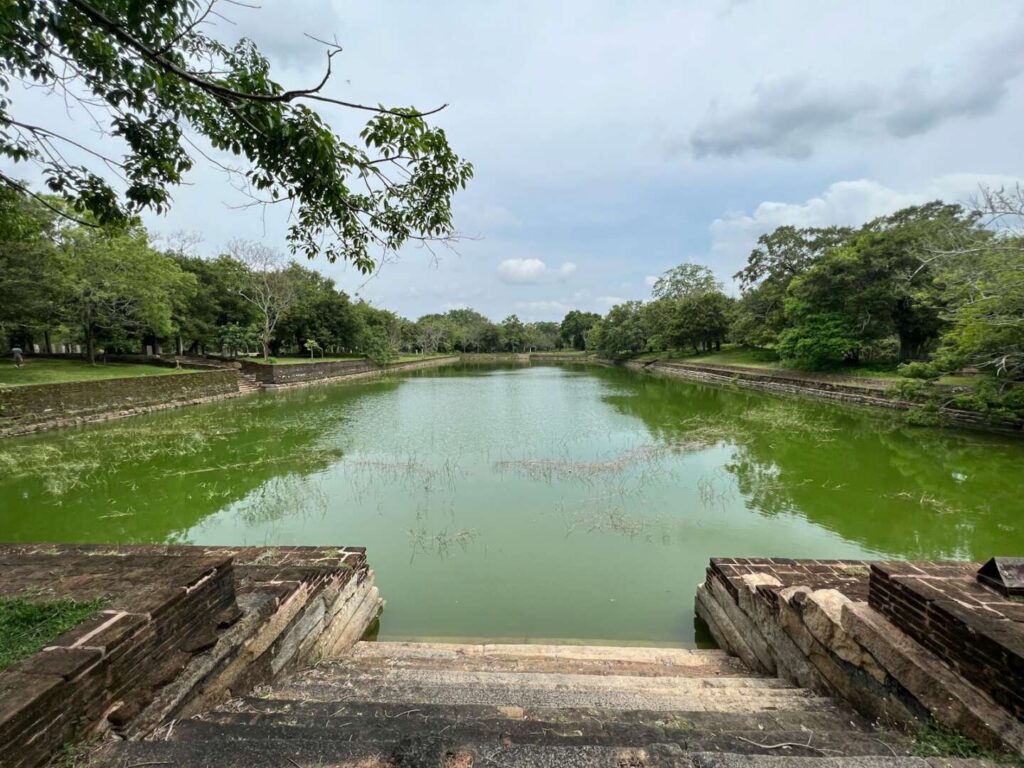 Ancient stupa and ruins at Anuradhapura archaeological site under a bright sky — supporting travel image 3
