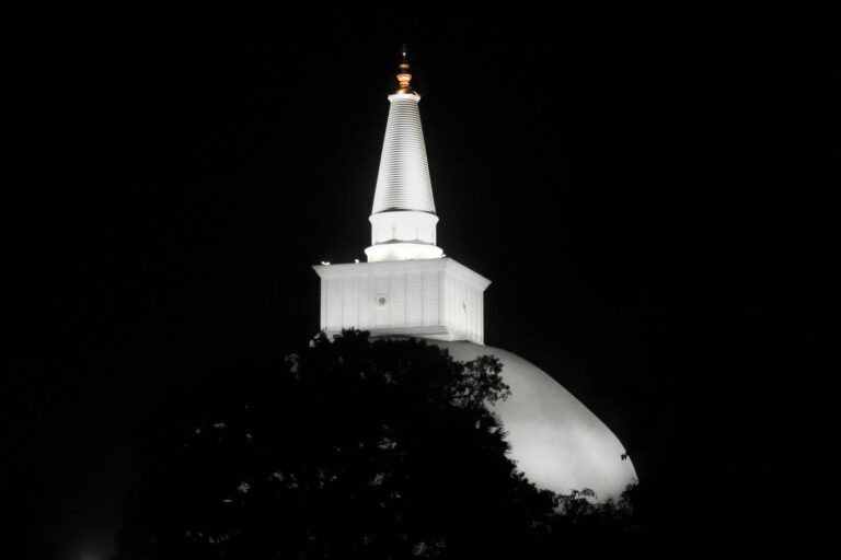 Alter Stupa in Anuradhapura with oil lamps