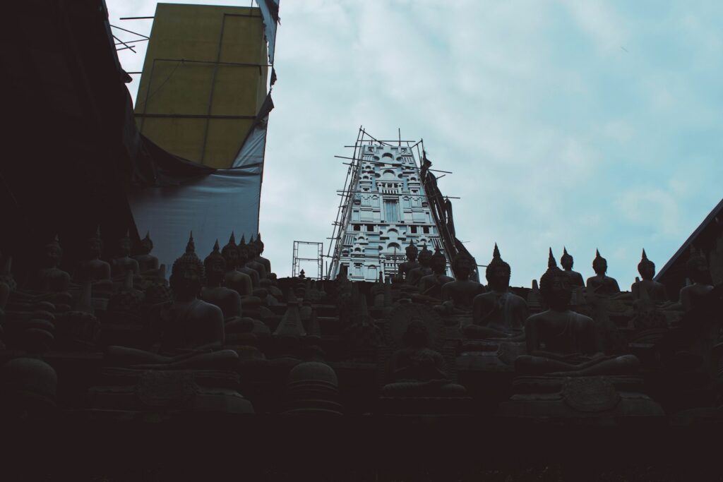 Evening view of illuminated ancient stupa at Anuradhapura with oil lamps glowing — supporting travel image 3